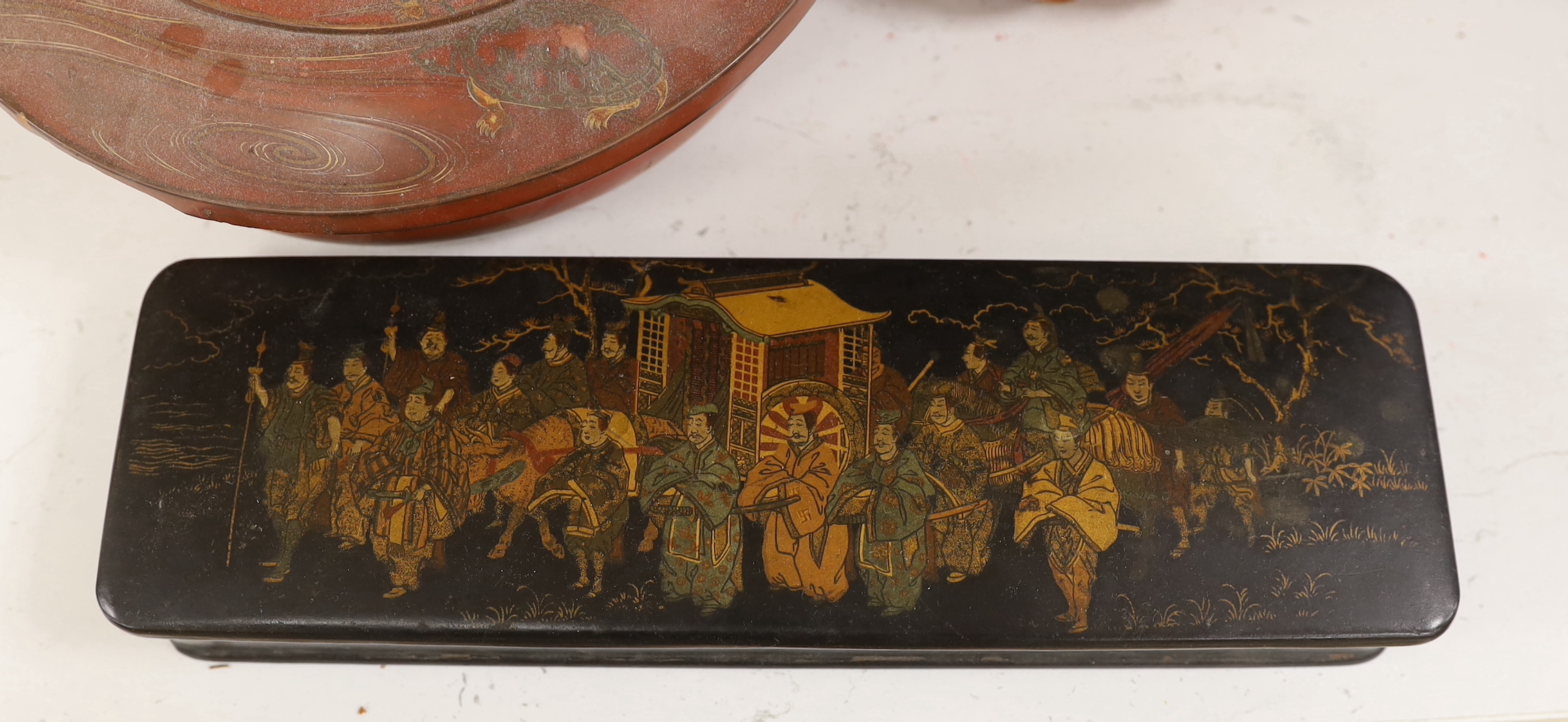 A Chinese black lacquer and mother of pearl box, two red lacquer boxes and a Chinoiserie painted box, largest 28cm wide, 37cm high